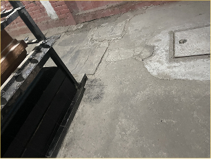 Cracked flooring around chuttambalam